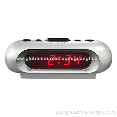 2014 Shenzhen latest LED table alarm clock with power outlet